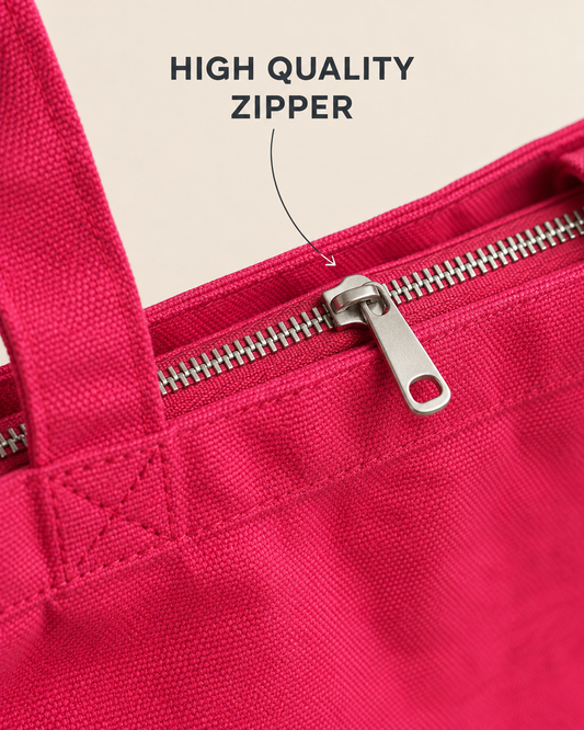 Close-up of the pink tote bag silver-tone zipper