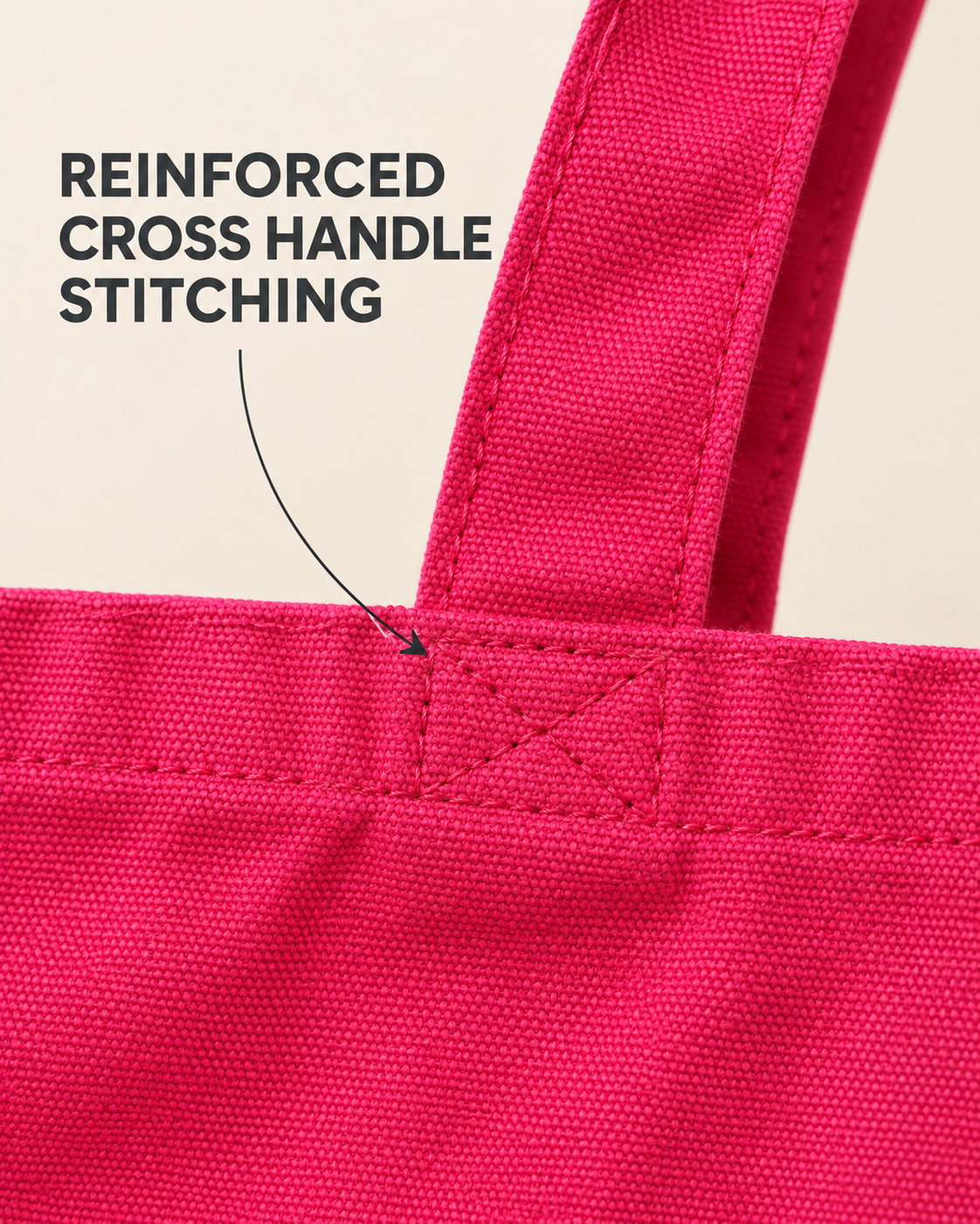 Close-up of reinforced handle stitching on the pink tote bag
